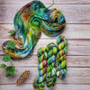 Light in the Forest -  Hand dyed variegated yarn - green purple blue lime toffee maroon