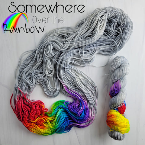 Somewhere Over the Rainbow - Hand dyed sock yarn - grey with rainbow roygbiv pop