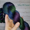 Raven - Hand dyed yarn - SW Merino Fingering Weight black Purple Blue Green