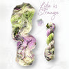 Life is Strange - Hand dyed variegated yarn - Indie Song Tracks collection - Merino Fingering to worsted dyed to order - white with pastel purple pink moss green speckles