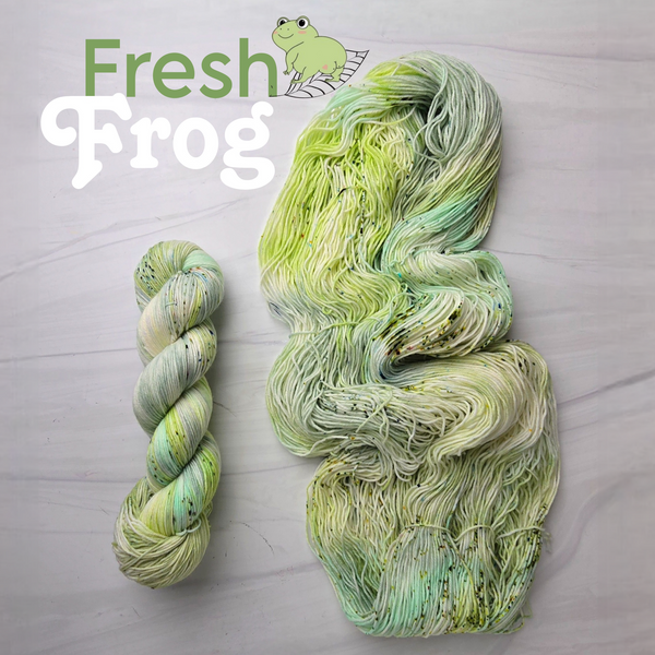Fresh Frog - Hand dyed yarn - dyed to order on fingering sock DK sport worsted Aran or bulky yarn - light pastel mossy and mint sage green with heavy speckles