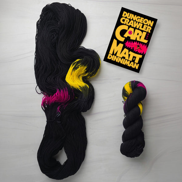 Dungeon Crawler - Hand dyed Assigned Pooling yarn, Fingering Weight, inspired by Dungeon Crawler Carl book series - Black with pops of yellow and magenta pink