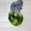 Folklore - Hand dyed sock yarn - grey and moss green speckled assigned color pooling yarn Taylor Swift inspired