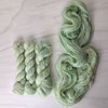 The Road Not Taken - Hand dyed yarn -  Taylor Swift inspired yarn Evermore green with speckles forest pastel moss sage pistachio