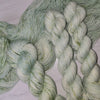 The Road Not Taken - Hand dyed yarn -  Taylor Swift inspired yarn Evermore green with speckles forest pastel moss sage pistachio