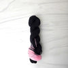 Everyone deserves the chance to fly - Hand dyed assigned pooling yarn - black with a pop of light pink based on wicked musical