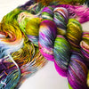 Creation is Louder Than Destruction - Hand dyed yarn, avocado green orange brown berry magenta teal with purple pink speckles - Andrea Gibson Poetry inspired