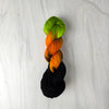 Harlequin Demon - Hand dyed yarn, assigned pooling - Nightmare Before Christmas inspired collection -  black orange neon green glows under blacklight