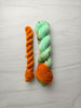 The Life Of A Showgirl - Hand dyed assigned pooling yarn, mint green and moss yarn with a pop of orange -  Taylor Swift inspired yarn