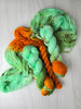 The Life Of A Showgirl - Hand dyed assigned pooling yarn, mint green and moss yarn with a pop of orange -  Taylor Swift inspired yarn