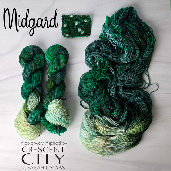 Midgard - Hand dyed Assigned Pooling yarn, Fingering Weight, speckled inspired by the Crescent City series by Sarah J Maas - multiple shades of green verdant kelly moss with a pastel green white speckled color pop