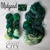 Midgard - Hand dyed Assigned Pooling yarn, Fingering Weight, speckled tonal inspired by the Crescent City series by Sarah J Maas - multiple shades of green verdant kelly moss with a pastel green white speckled color pop