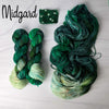 Midgard - Hand dyed Assigned Pooling yarn, Fingering Weight, speckled tonal inspired by the Crescent City series by Sarah J Maas - multiple shades of green verdant kelly moss with a pastel green white speckled color pop