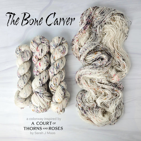 The Bone Carver - Hand dyed yarn, Fingering Weight, speckled  inspired by ACOTAR by Sarah J Maas - white cream yarn with grey rainbow speckles