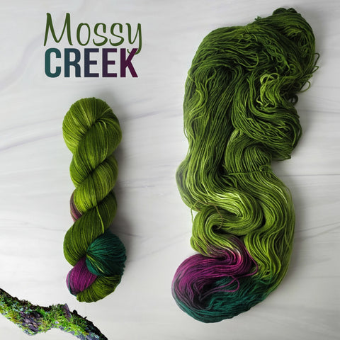 Mossy Creek - Hand dyed assigned pooling yarn - moss green with burgundy maroon and teal forest pop