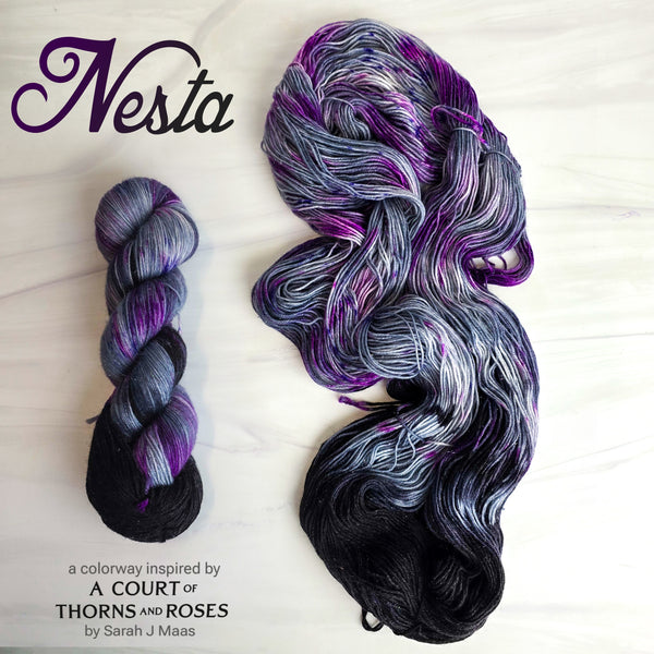 Nesta - Hand dyed yarn, Fingering Weight, speckled assigned pooling inspired by ACOTAR by Sarah J Maas - Silver with berry splashes and a pop of black