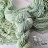 The Road Not Taken - Hand dyed yarn -  Taylor Swift inspired yarn Evermore green with speckles forest pastel moss sage pistachio