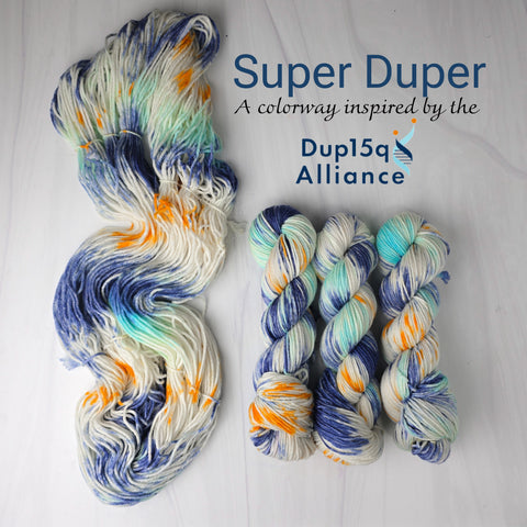 Super Duper - Hand dyed yarn, white with splashes of navy turquoise and orange dup15q alliance colors