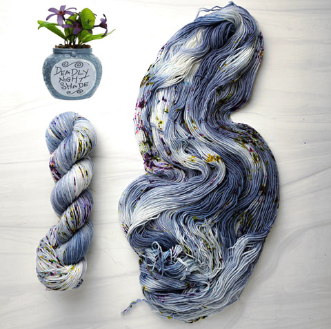 Deadly Nightshade - Hand dyed yarn - Nightmare Before Christmas inspired collection - blue grey with speckles purple green moss