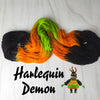 Harlequin Demon - Hand dyed yarn, assigned pooling - Nightmare Before Christmas inspired collection -  black orange neon green glows under blacklight