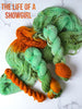 The Life Of A Showgirl - Hand dyed assigned pooling yarn, mint green and moss yarn with a pop of orange -  Taylor Swift inspired yarn
