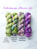 Twisting the Kaleidoscope - Hand dyed yarn, light moss green periwinkle lilac lavender purple with dark moss green and purple speckles inspired by twenty one pilots 21 lyrics