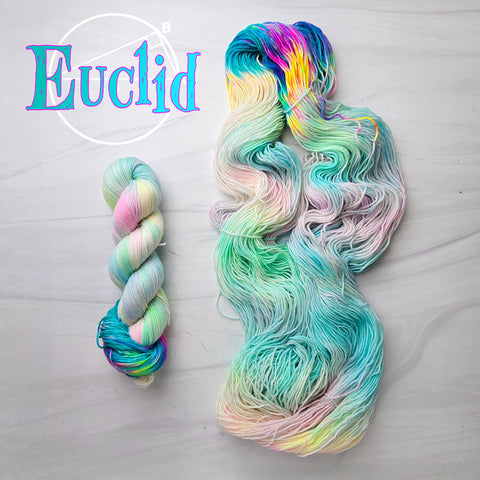 Euclid - Hand dyed Variegated assigned pooling yarn -  Fingering to bulky- pastel turquoise and rainbow with pop of vibrant darker rainbow colors inspired by sleep token song