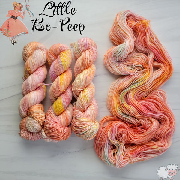 Little Bo Peep - Hand dyed variegated yarn -pastel peach coral orange with rainbow pops - lullabies and nursery rhymes collection