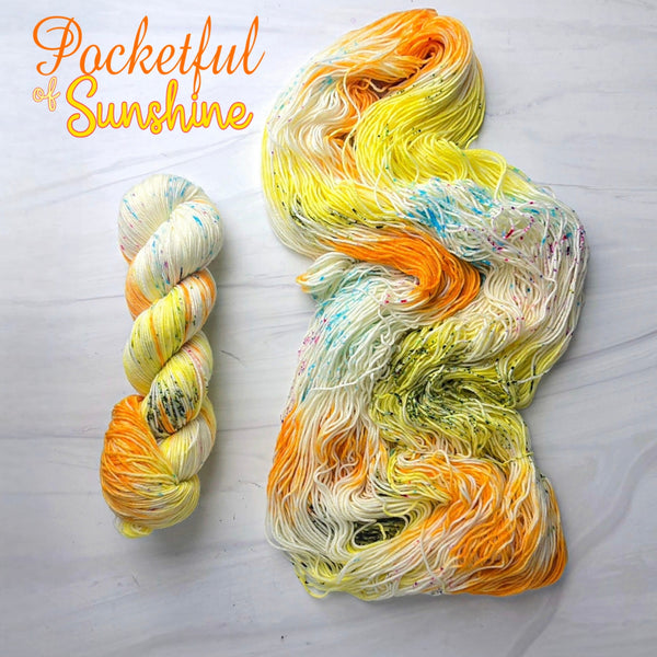 Pocketful Of Sunshine - Hand dyed yarn, white  orange yellow with green and blue and purple speckles