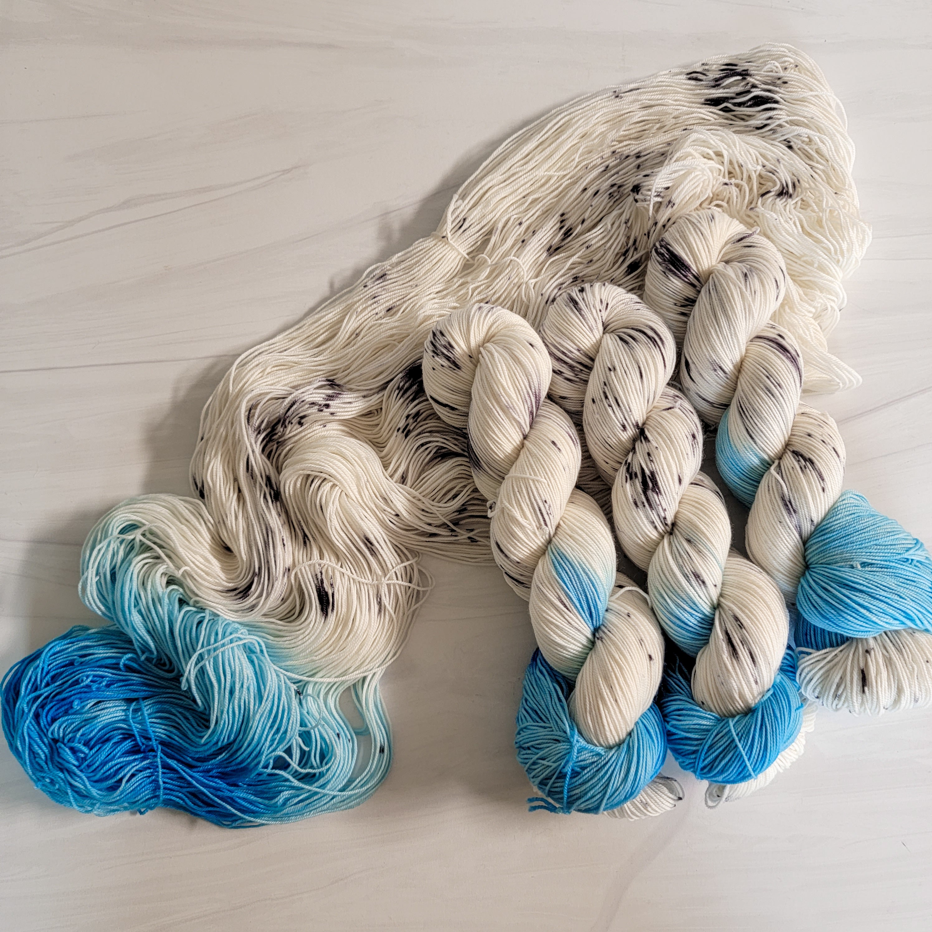 Blue Dress On A Boat- Hand dyed yarn, white blue black speckled - Tayl | Blue Barn Fiber Blue Dress On A Boat- Hand dyed yarn, white blue black speckled - Tayl | Blue Barn Fiber