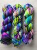 You Will Not Break Me - Hand dyed variegated  yarn, Fingering Weight, inspired by Dungeon Crawler Carl book series - white purple green lime blue splashed in vibrant neon speckles and black