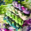 May our falling be the most beautiful climb - Hand dyed yarn, white pastel purple rich violet magenta grass green with speckles of teal pink purple green - Andrea Gibson Poetry inspired