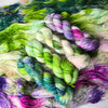 Imagination is an act of liberation - Hand dyed yarn, white with rich grass green and pastel purple pink peach yellow and speckles of mood green purple pink teal - Andrea Gibson Poetry inspired