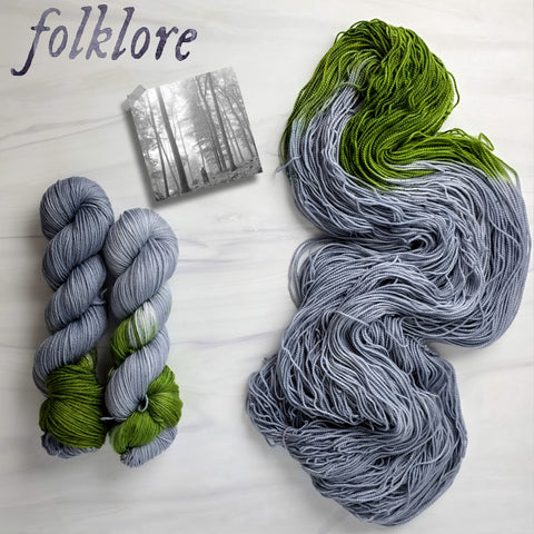 Folklore - Hand dyed sock yarn - grey and moss green speckled assigned color pooling yarn Taylor Swift inspired