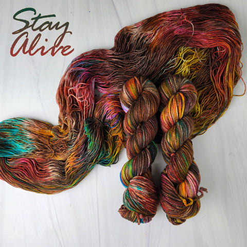 Stay Alive - Hand dyed Variegated yarn -  transformation series - twenty one pilots inspired - Fingering to bulky-  brown caramel rust rainbow with pink blue yellow pops