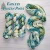 Endless Frozen Pines- Hand dyed variegated yarn - Indie Song Tracks collection - Merino Fingering to worsted dyed to order - white with teal and moss green with pink purple speckles