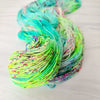 Something to Look Forward to - Hand dyed Variegated yarn -  Fingering to bulky-  Hope series - neon aqua blue green yellow with pink and rainbow speckles