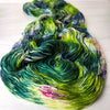 Other People Feel This Too - Hand dyed yarn, bright avocado lime green with teal and purple pink speckles - Andrea Gibson Poetry inspired