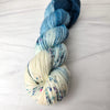 Azriel - Hand dyed yarn, Fingering Weight, speckled assigned pooling inspired by ACOTAR by Sarah J Maas - white with speckles and dark navy teal blue