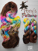 Pony's Potions - Hand dyed Variegated yarn, Fingering Weight, inspired by Dungeon Crawler Carl book series - warm brown with a pop of white splashed in rainbow and black purple speckles