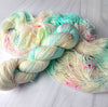 Everything is Going to be Okay - Hand dyed yarn, white light aqua with pink neon yellow and blue speckles