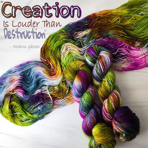 Creation is Louder Than Destruction - Hand dyed yarn, avocado green orange brown berry magenta teal with purple pink speckles - Andrea Gibson Poetry inspired