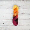 Chase the Light - Hand dyed variegated yarn - yellow orange brown maroon palindrome