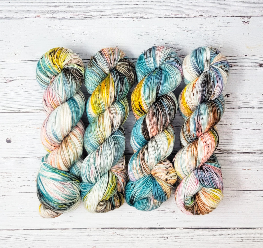 Desert Wildflower - Hand dyed variegated speckled yarn - Merino Finger