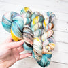 Flower Girl - Hand dyed variegated speckled yarn - Merino Fingering to worsted teal white pink brown yellow