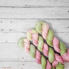 Fairy Feet- Hand dyed yarn - SW Merino Fingering knitting crocheting weaving- pink green moss earthy