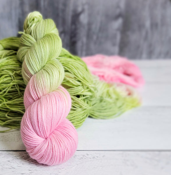Petal-  Hand dyed yarn - SW Merino Fingering knitting crocheting weaving- pink green palindrome
