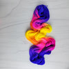 Neon Sunset - Hand dyed yarn, Fingering Weight, florescent fuchsia yellow violet purple glows in black light