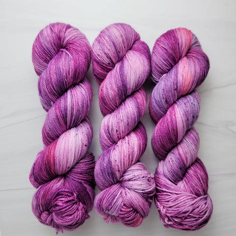 Raspberry Truffle-  Hand dyed yarn - Hand painted yarn - SW Merino Fingering Weight  400+ yards - Select your base - raspberry pink purple with speckles