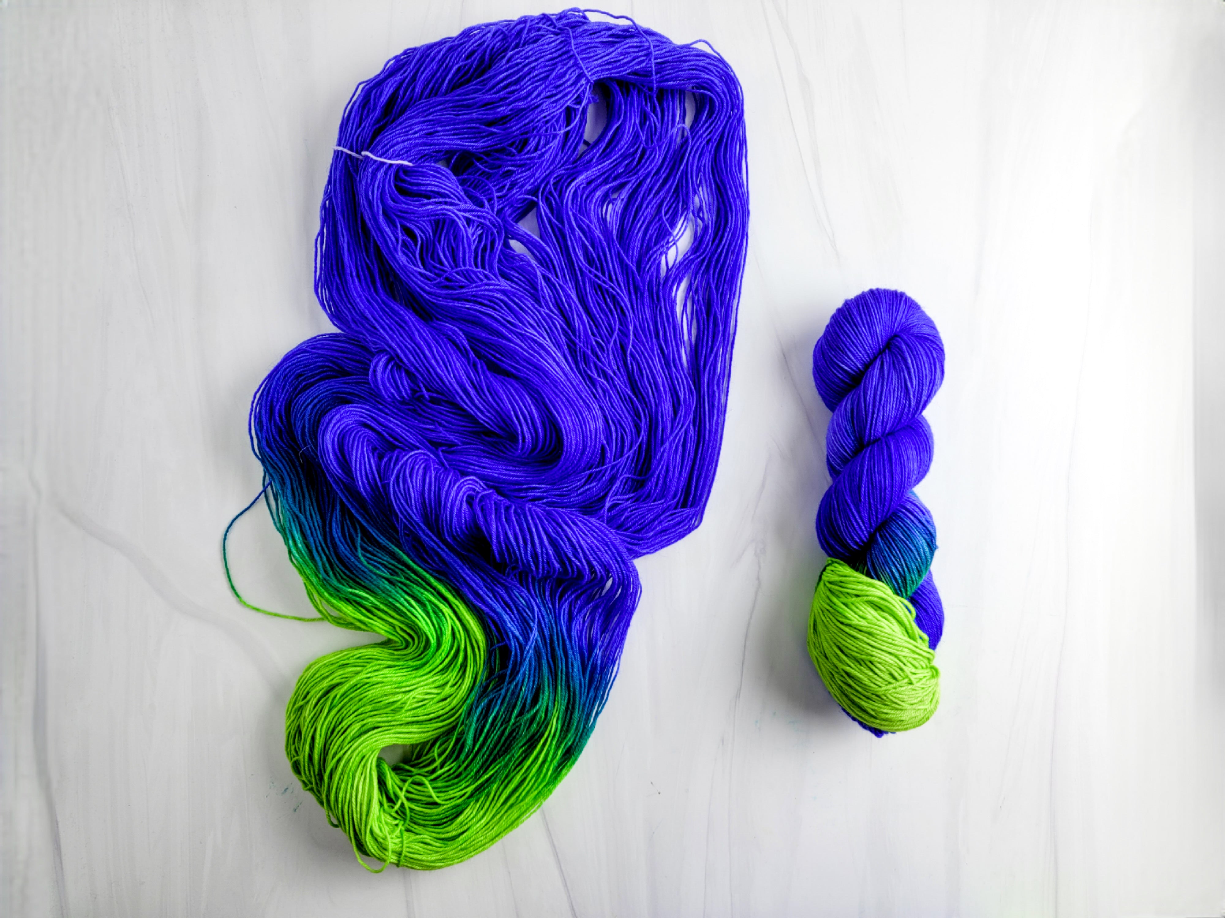 Medusa - Hand dyed assigned pooling yarn - blue violet and green